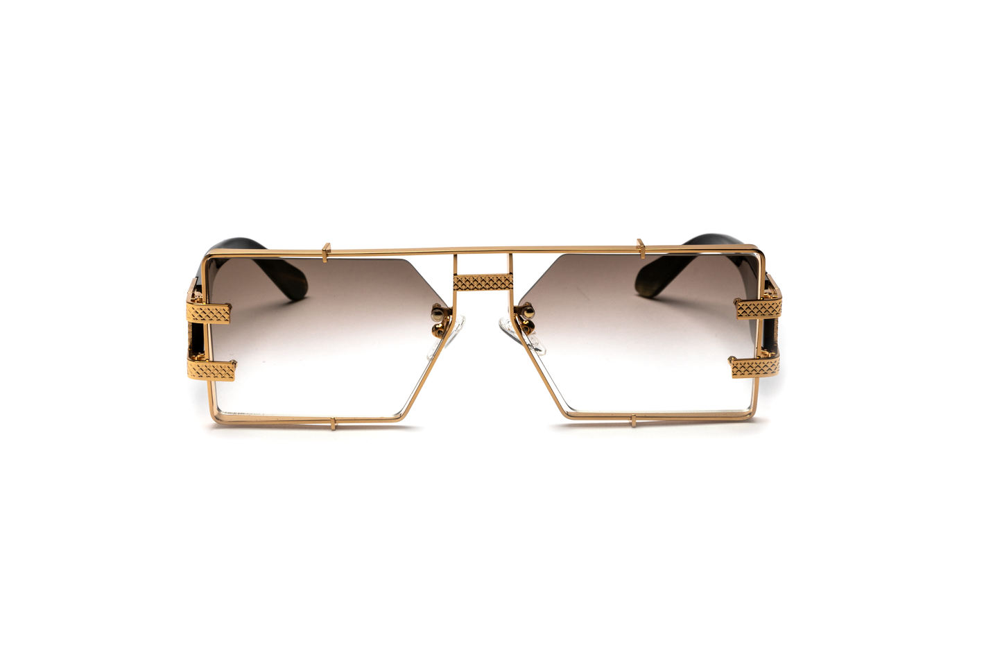 Front-angle product image of black buffalo horn sunglasses from Vintage Wood Collection, featuring 24-karat gold detailing and gradient brown lenses. The sunglasses have a sleek, street-style design and are displayed on a clean white background.