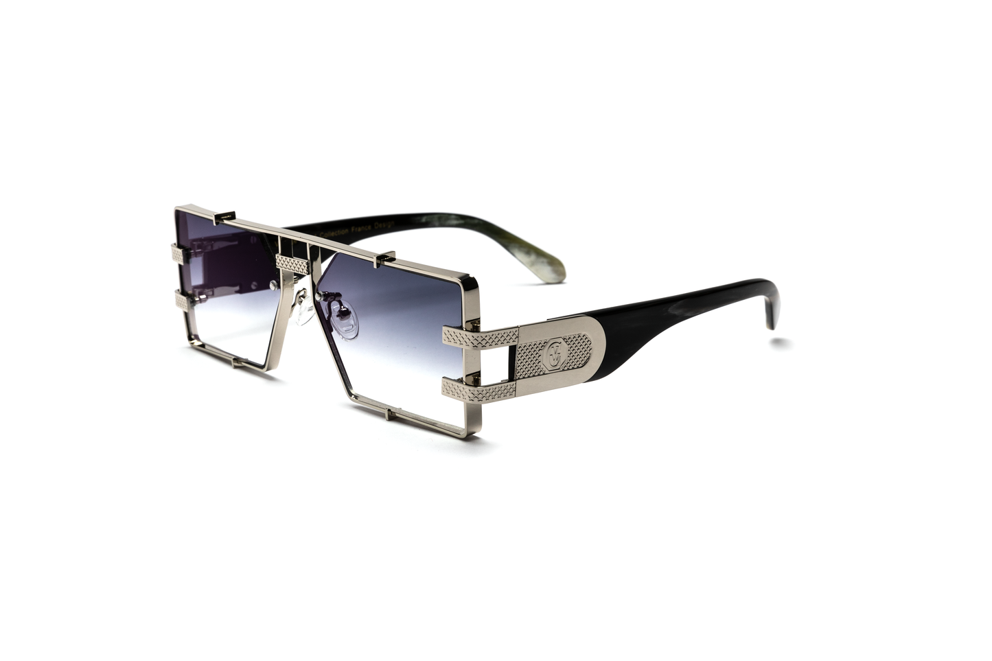 Side-angle product image of black and silver buffalo horn sunglasses from Vintage Wood Collection, featuring sleek metal detailing and gradient grey lenses. The sunglasses have a modern, street-style design and are displayed on a clean white background.