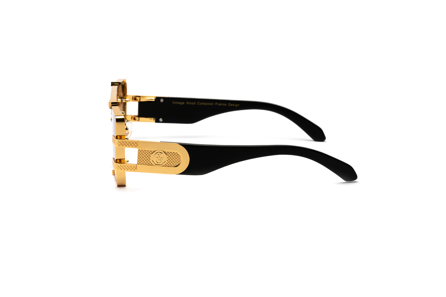 Side-angle product image of black wood and 24-karat gold sunglasses from Vintage Wood Collection, featuring gradient brown lenses and a sleek metal frame. The sunglasses have a bold, street-style design and are displayed on a clean white background.
