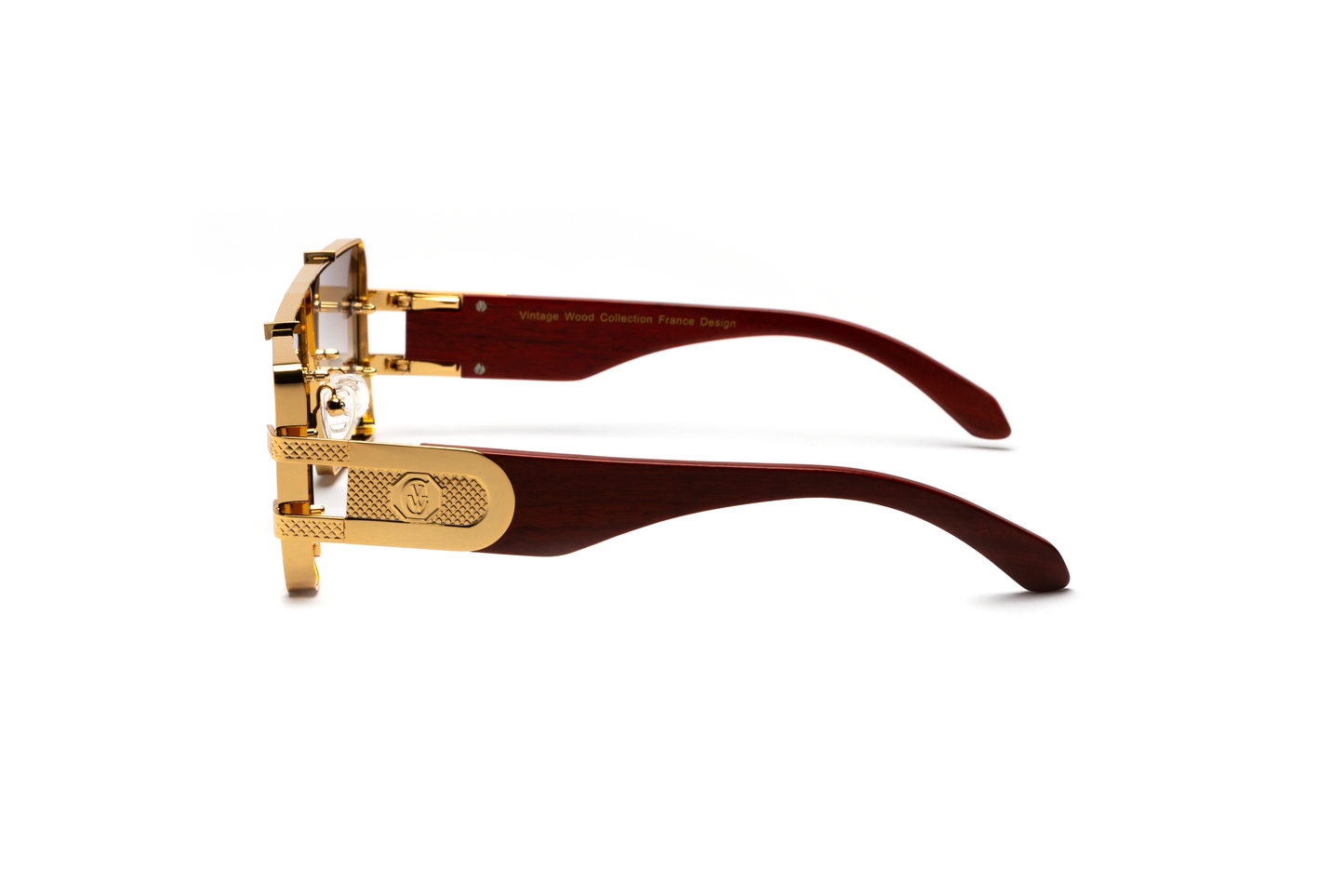 Side-angle product image of brown wood and 24-karat gold sunglasses from Vintage Wood Collection, featuring gradient brown lenses and a refined metal frame. The sunglasses have a polished, street-style design and are displayed on a clean white background.