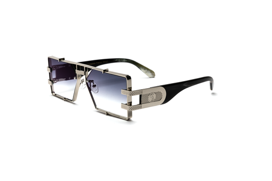 Side-angle product image of black and silver buffalo horn sunglasses from Vintage Wood Collection, featuring sleek metal detailing and gradient grey lenses. The sunglasses have a modern, street-style design and are displayed on a clean white background.