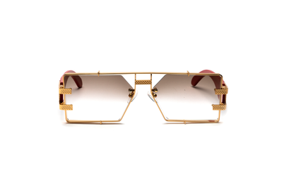 Front-angle product image of redwood and 24-karat gold sunglasses from Vintage Wood Collection, featuring gradient brown lenses and a polished metal frame. The sunglasses have a warm, street-style design and are displayed on a clean white background.