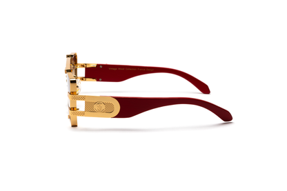 Side-angle product image of redwood and 24-karat gold sunglasses from Vintage Wood Collection, featuring gradient brown lenses and a polished metal frame. The sunglasses have a warm, street-style design and are displayed on a clean white background.