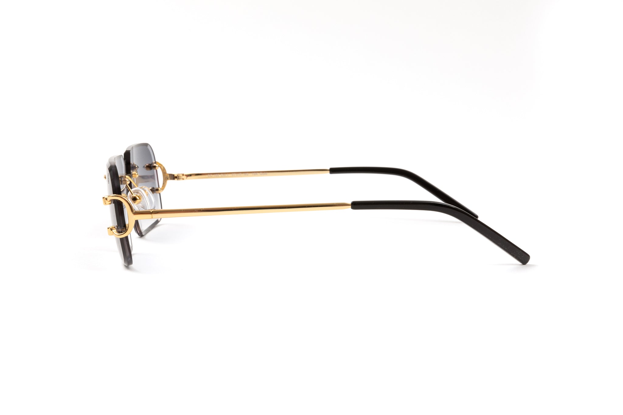 side view of 18kt gold rimless classic c sunglasses frames 