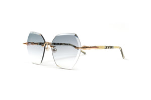 18kt gold women's sunglasses with buffalo horn looking acetate and pearl nose pads