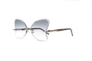 women's butterfly lens eyewear with pearl nose pads and an acetate brown and blue frame