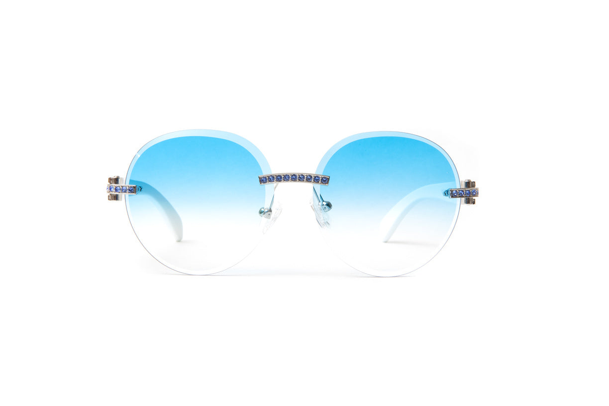Blue Swarovski diamond sunglasses with white wood temples similar to Cartier and round gradient blue lenses by VWC Eyewear